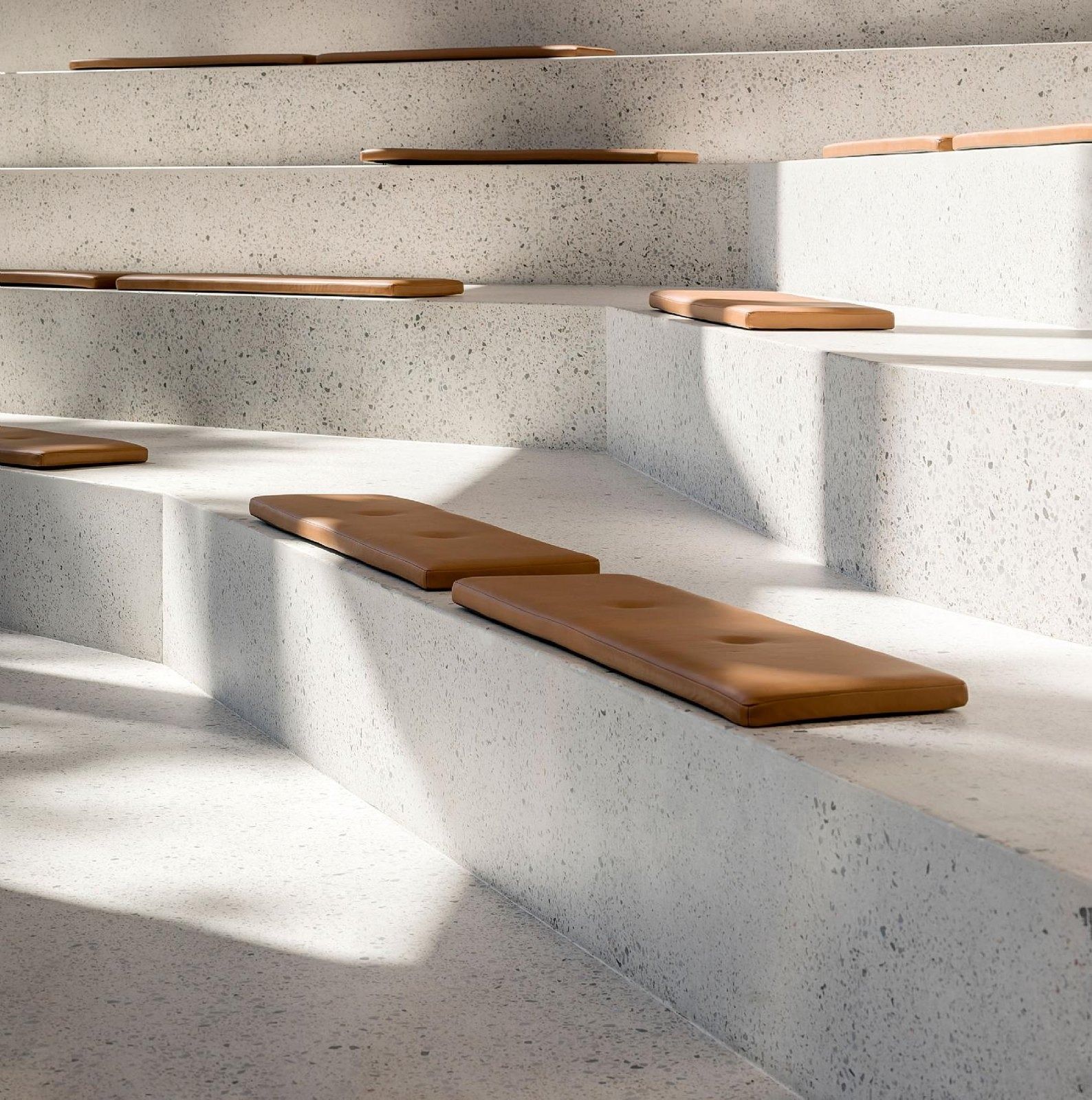 Carlsberg: Close-up of terrazzo steps with brown leather seat pads