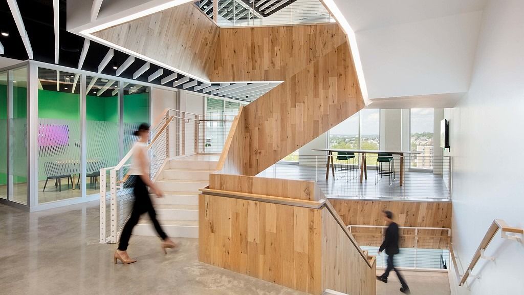 Cencora: A sculptural timber stair connecting two floors next to big windows