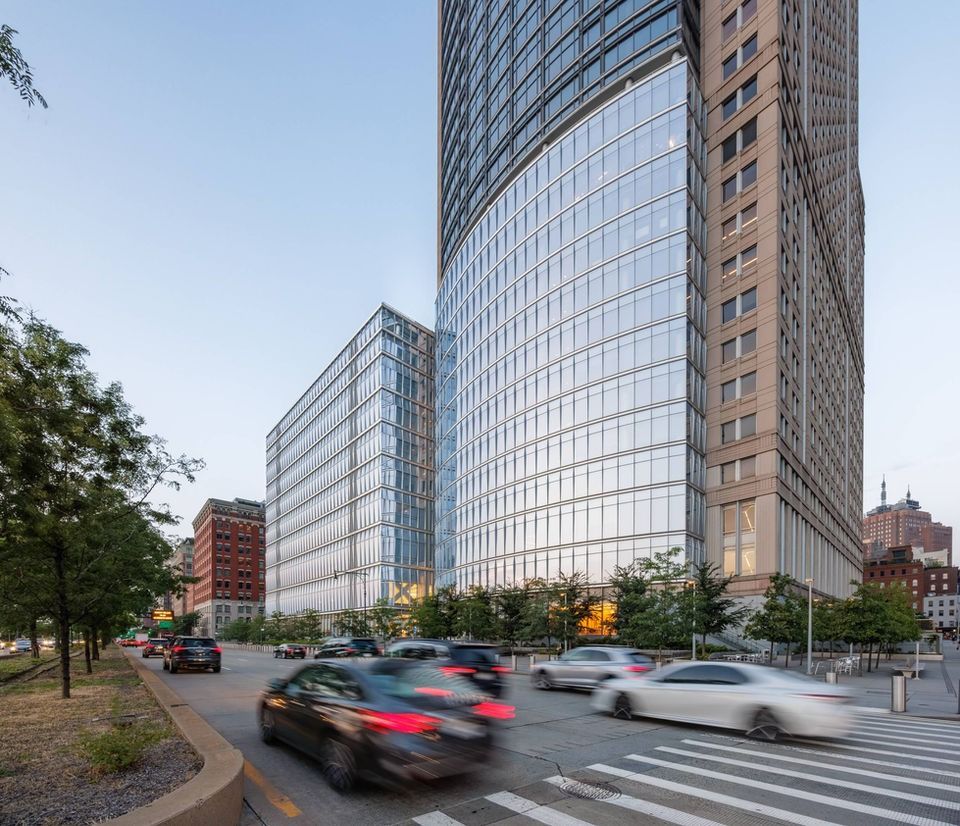 Citigroup: Curved glass tower above a busy street