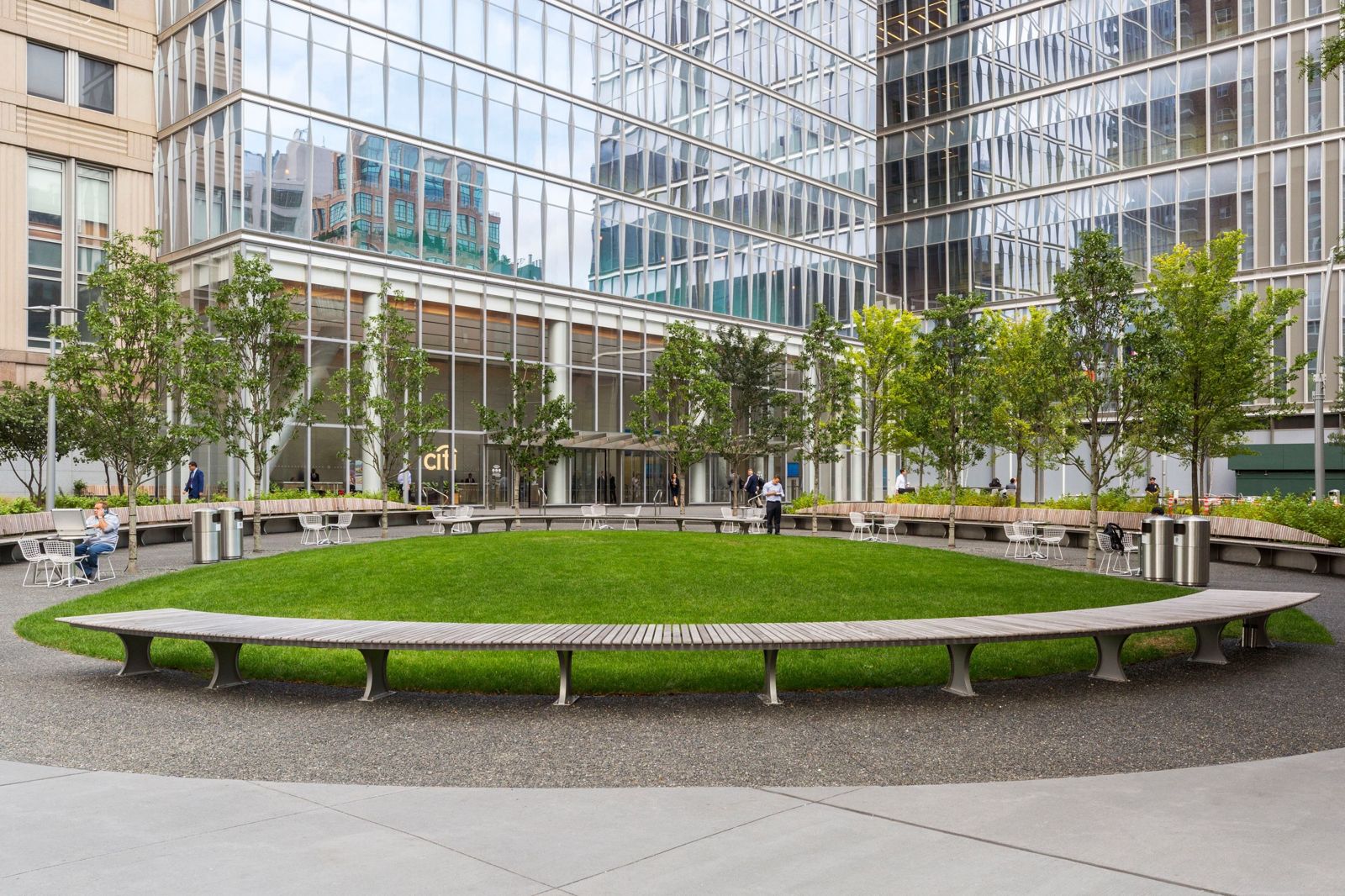 Citigroup: Oval lawn ringed by a curved bench in front of the towers