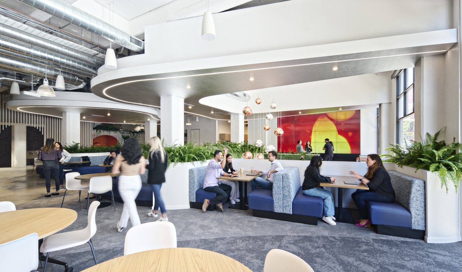 Cloudflare: A café with banquettes and planters