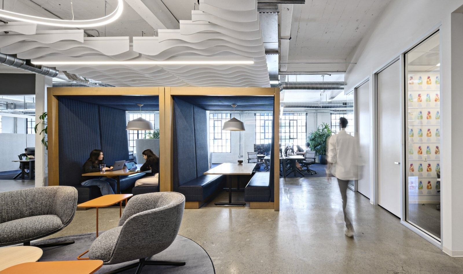 Cloudflare: Meeting booths beside a lounge