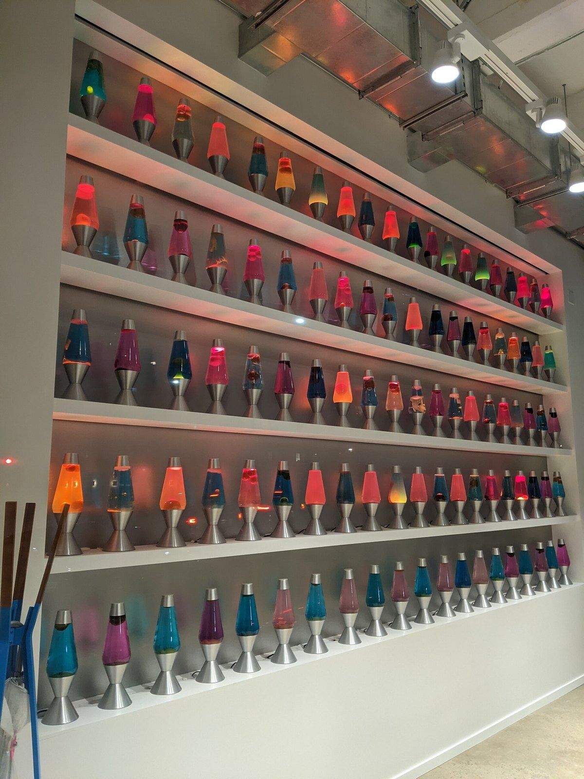 Cloudflare: Rows of colorful lava lamps on shelves