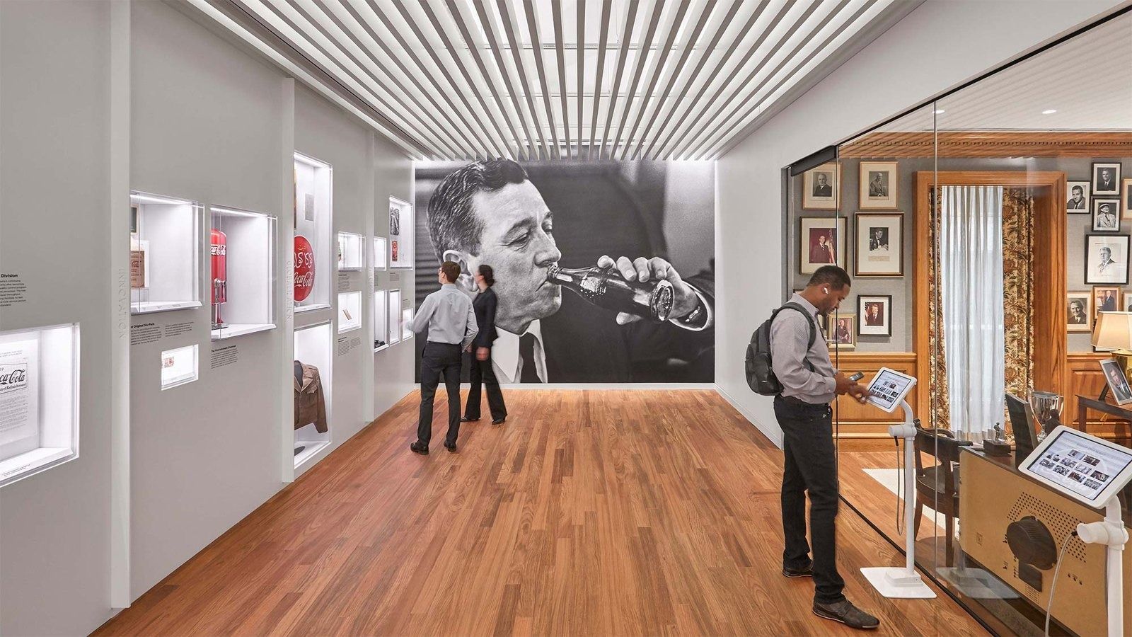 The Coca-Cola Company: A gallery corridor with archive photos and displays