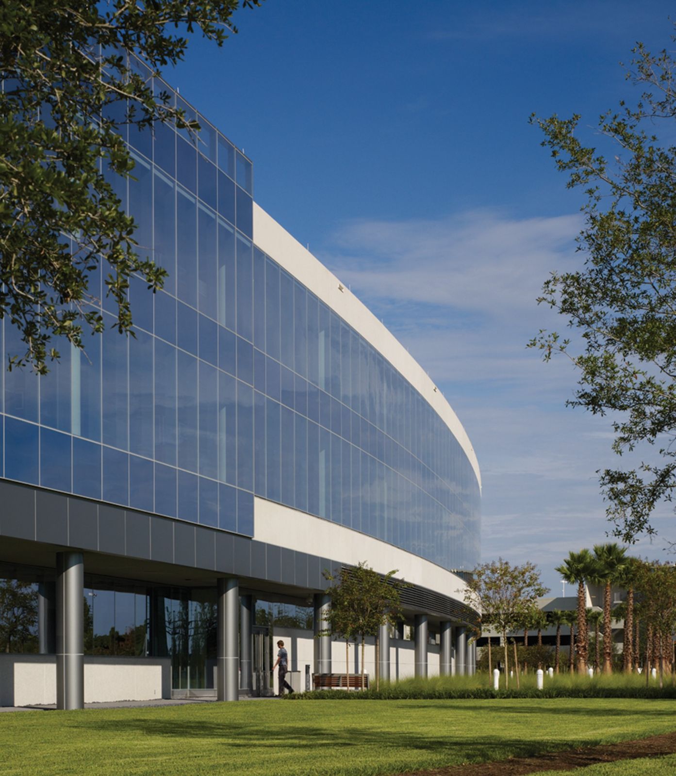 Darden Restaurants: A curving glass facade above a lawn framed by trees