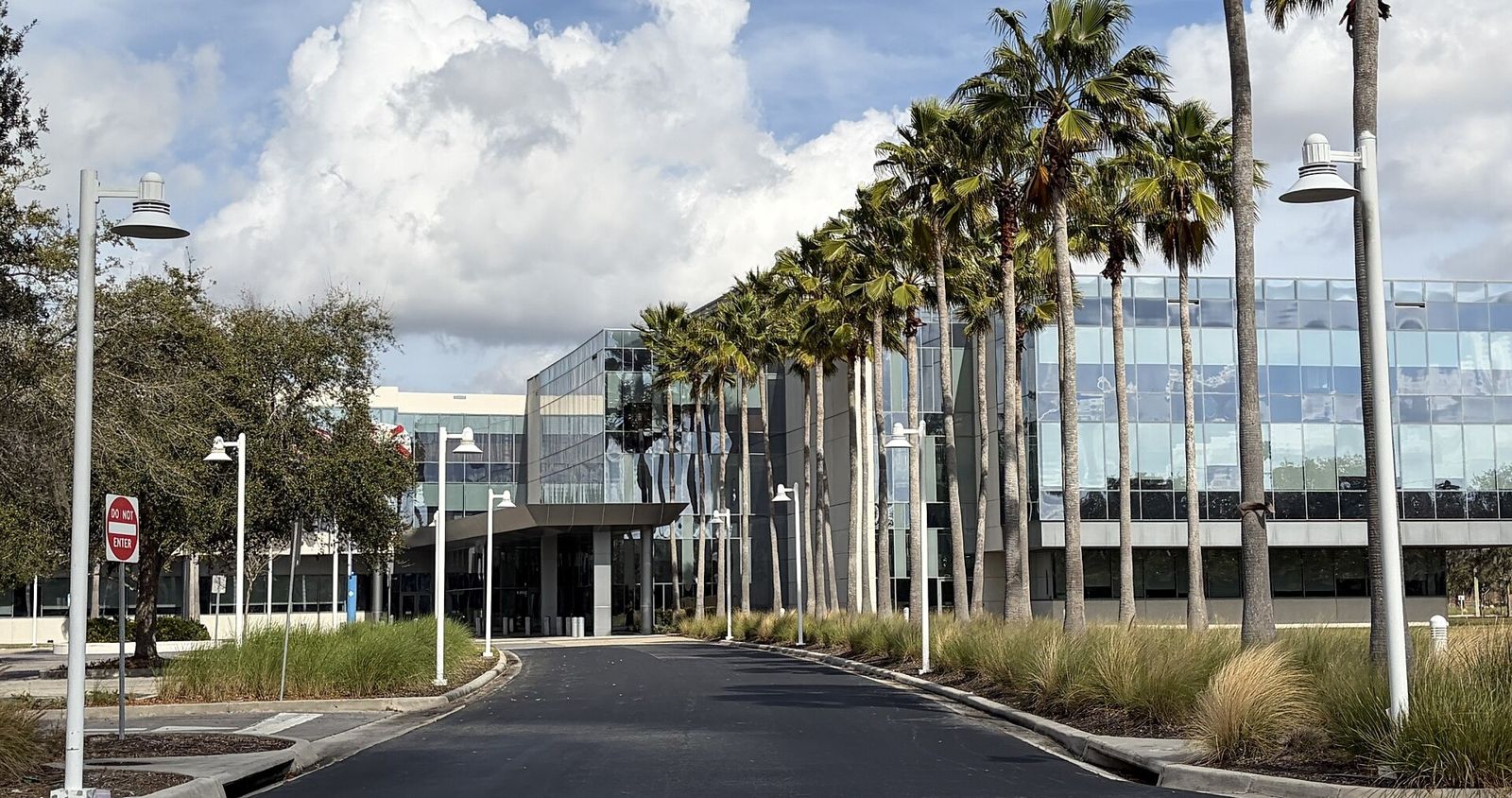 Darden Restaurants: A palm-lined drive leading to a glass office building