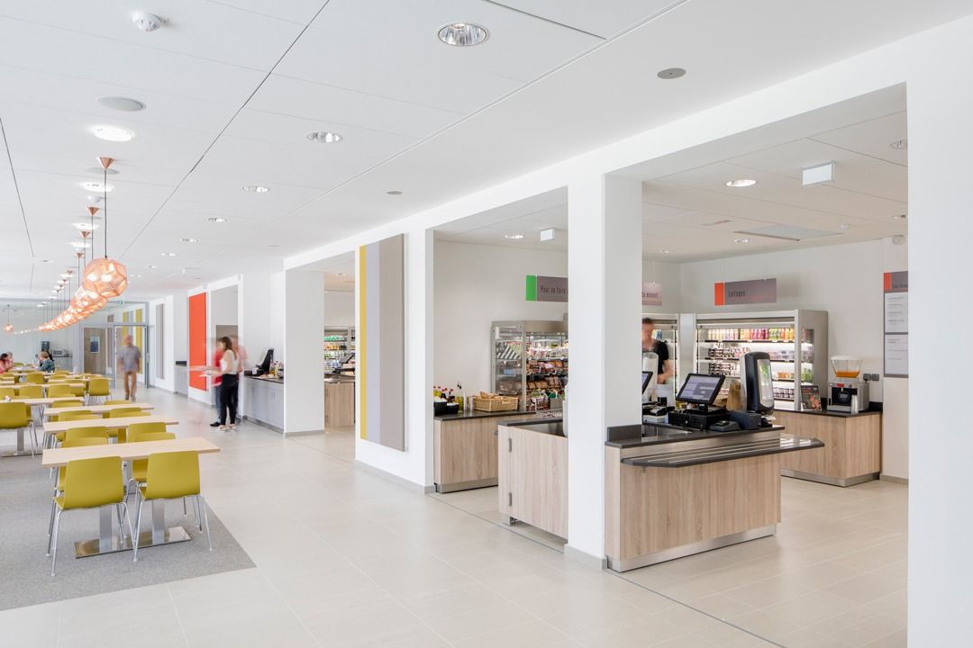 Dassault Systèmes: Café counters and yellow chairs