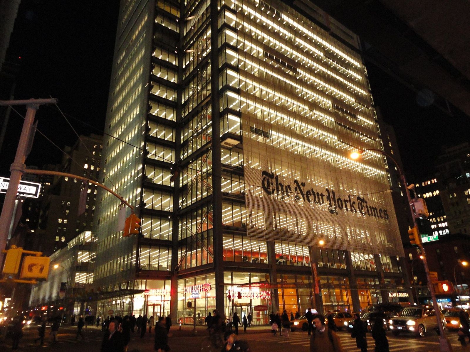 Datadog: The tower lit up at night with its name on the facade