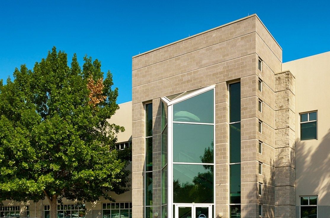 Dell Technologies: A stone and glass stair tower