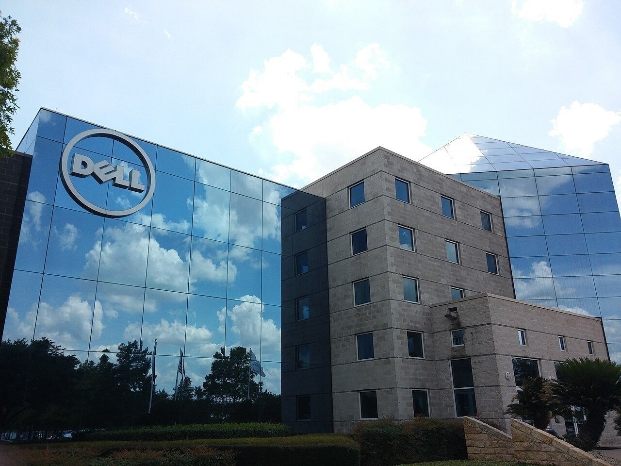 Glass and stone office building with the Dell logo
