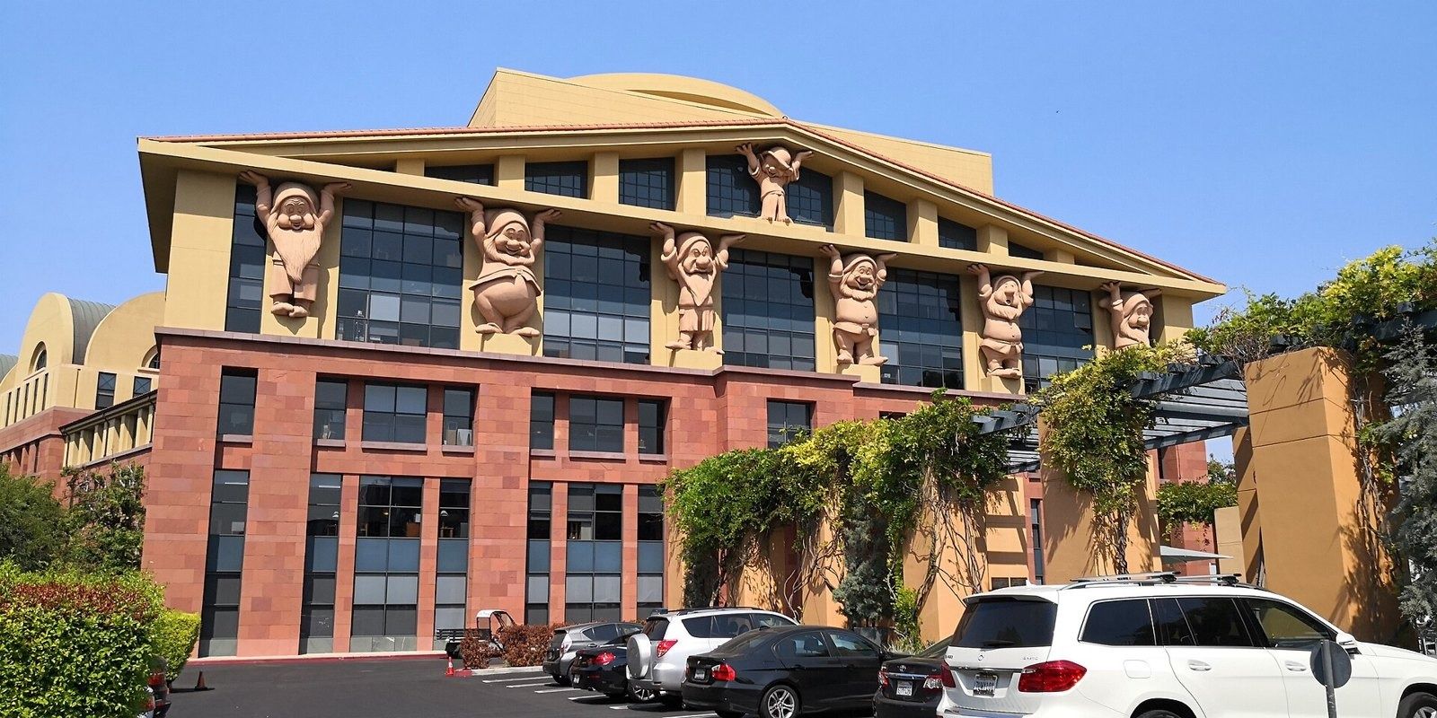 The Walt Disney Company: The Team Disney building with all seven Dwarfs
