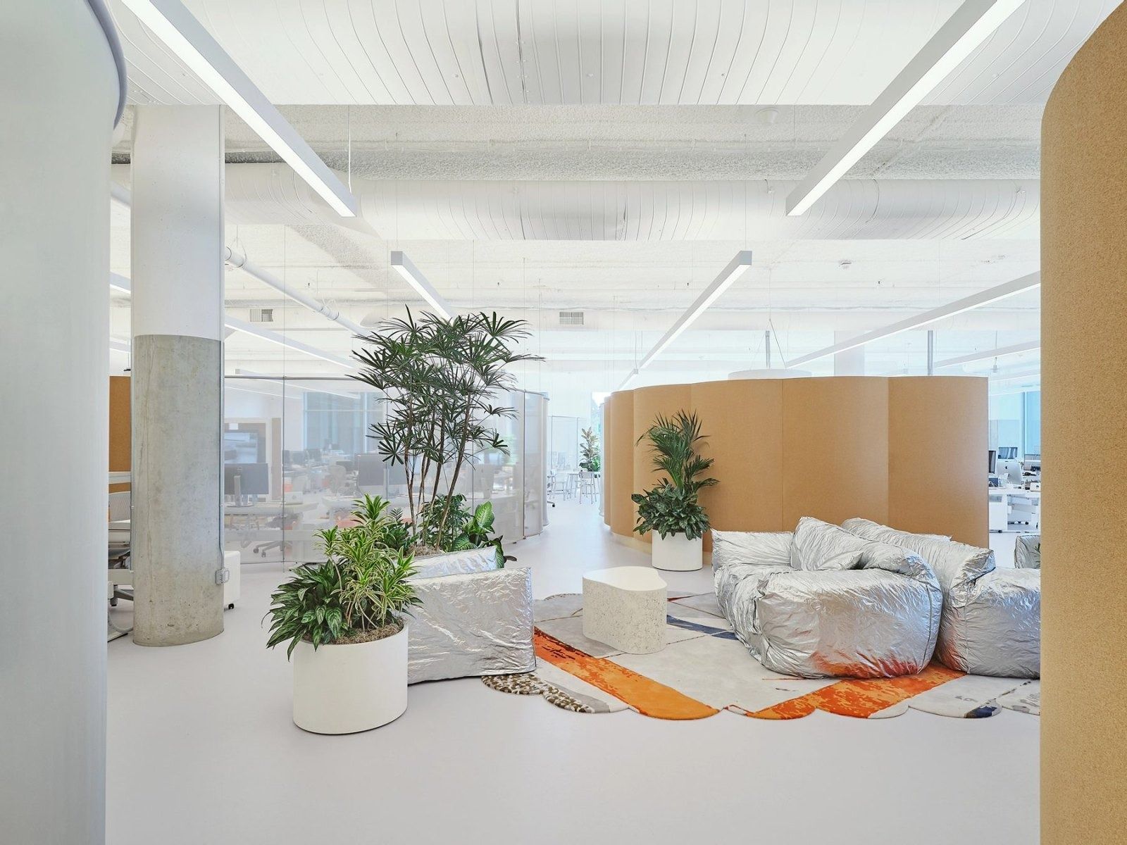 Dropbox: Soft seating among plants by cork walls