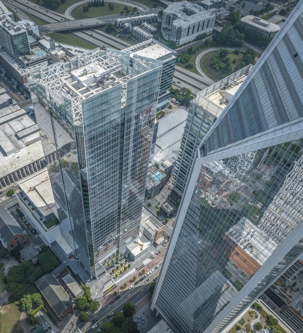 Duke Energy: Aerial view of a glass tower among Uptown towers