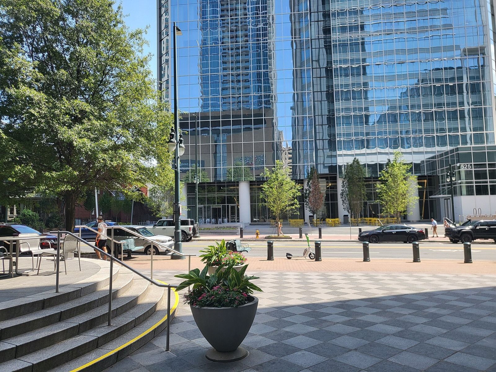 Duke Energy: Plaza steps and seating at the foot of glass towers