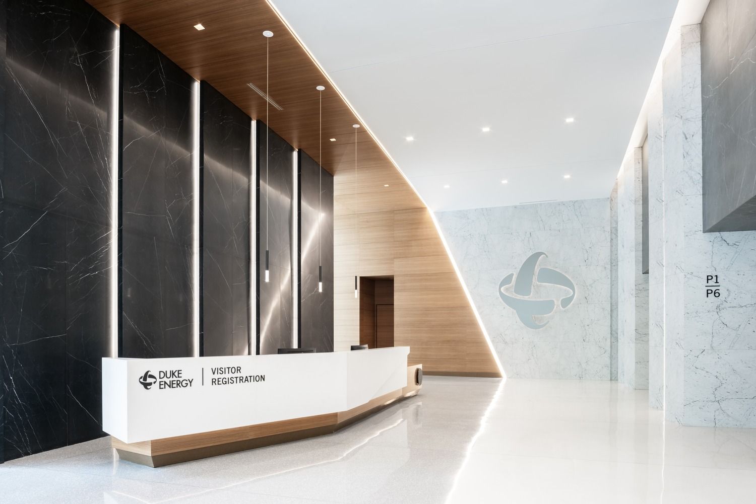 Duke Energy: Visitor desk in front of marble walls