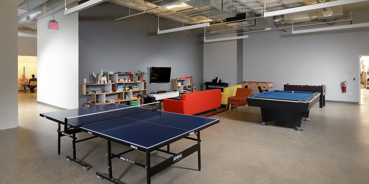 Duolingo: Ping-pong table and pool table in an open games area