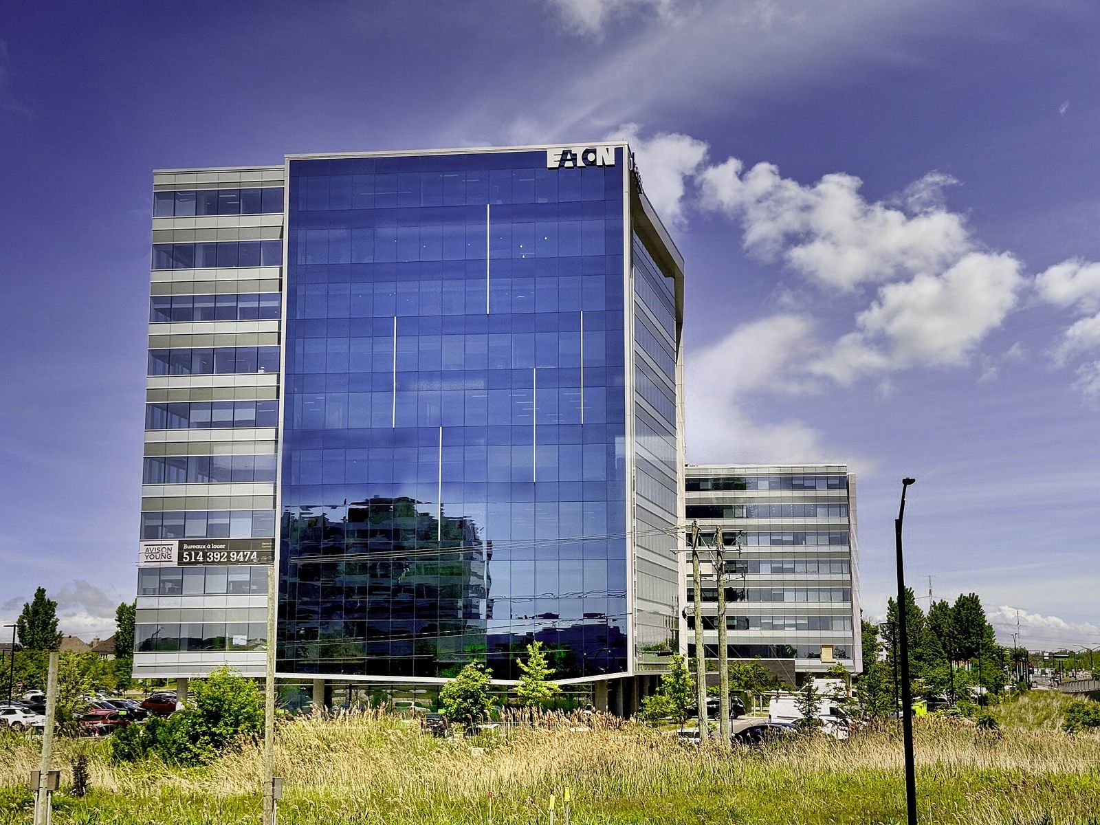 Eaton: A blue glass office building with the Eaton name on top