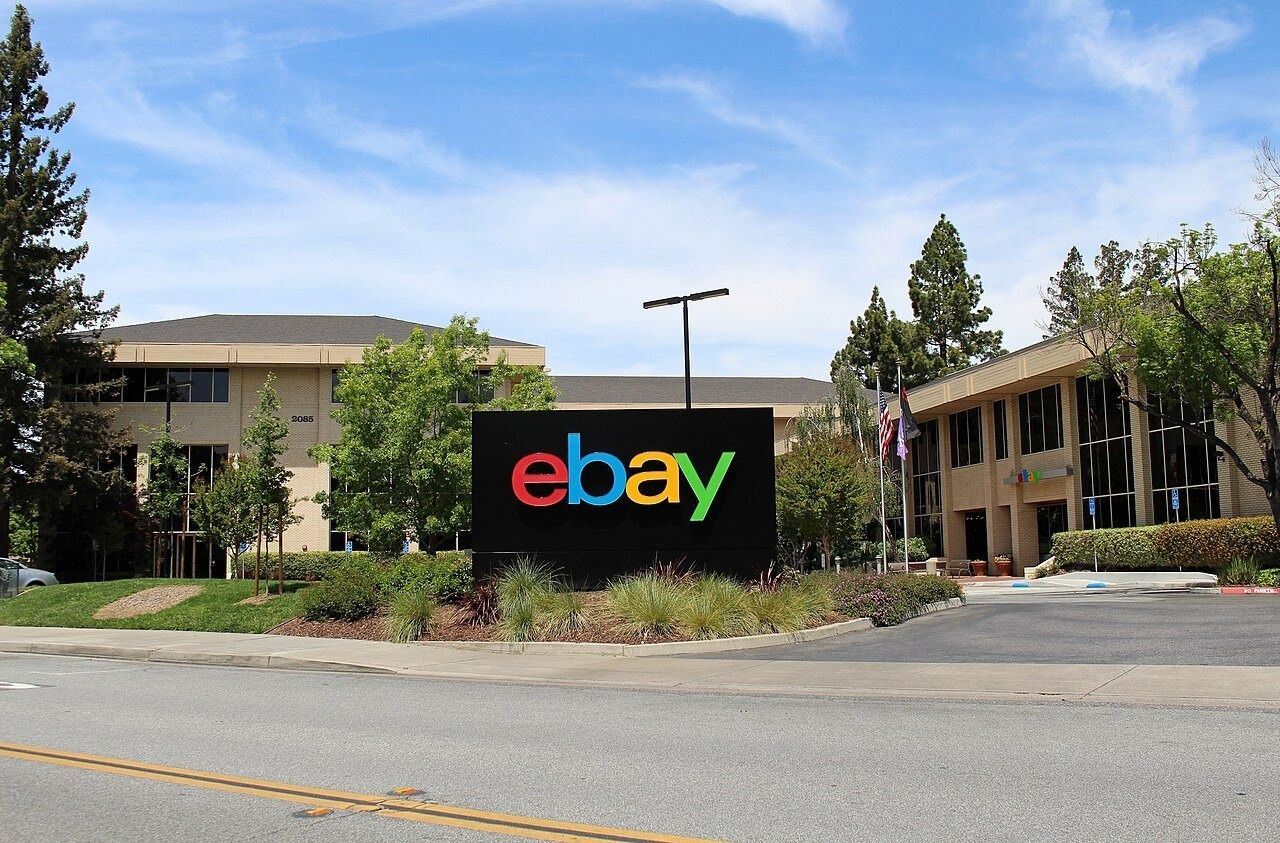 Low office buildings behind an eBay sign