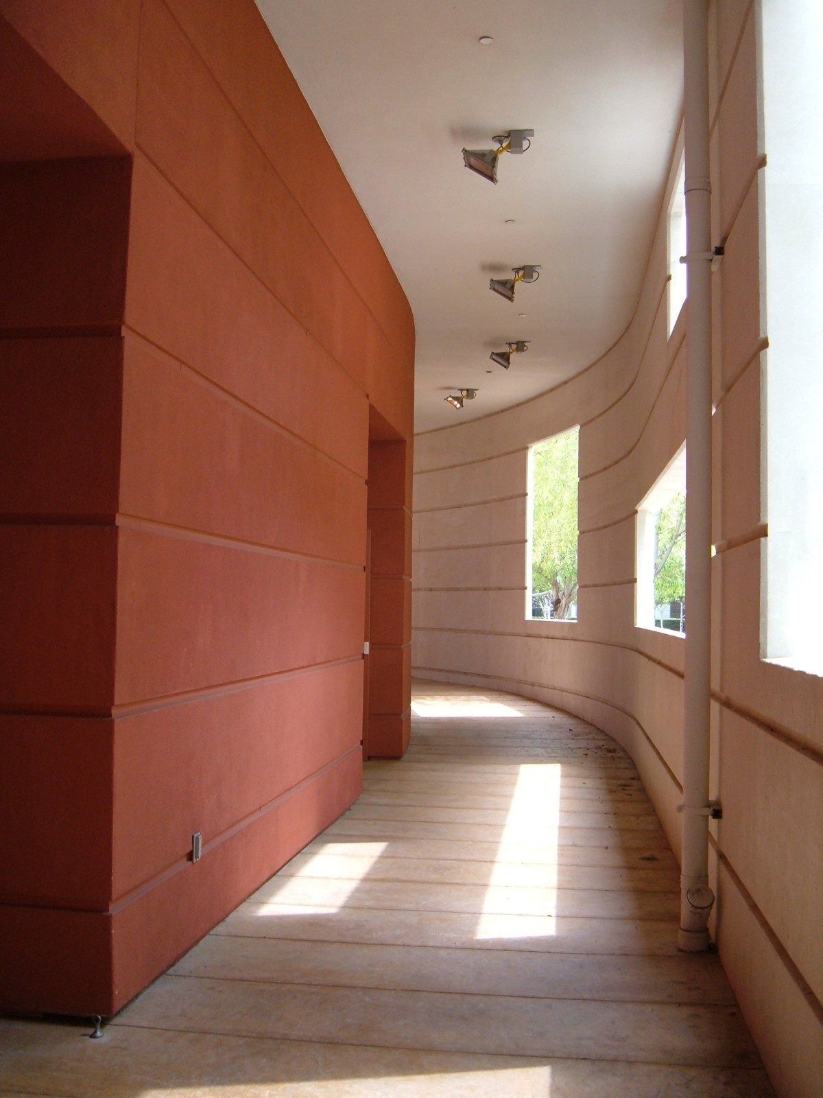 Electronic Arts: Curved corridor with warm red wall panels