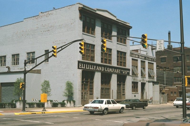 Old brick factory building with an Eli Lilly and Company sign