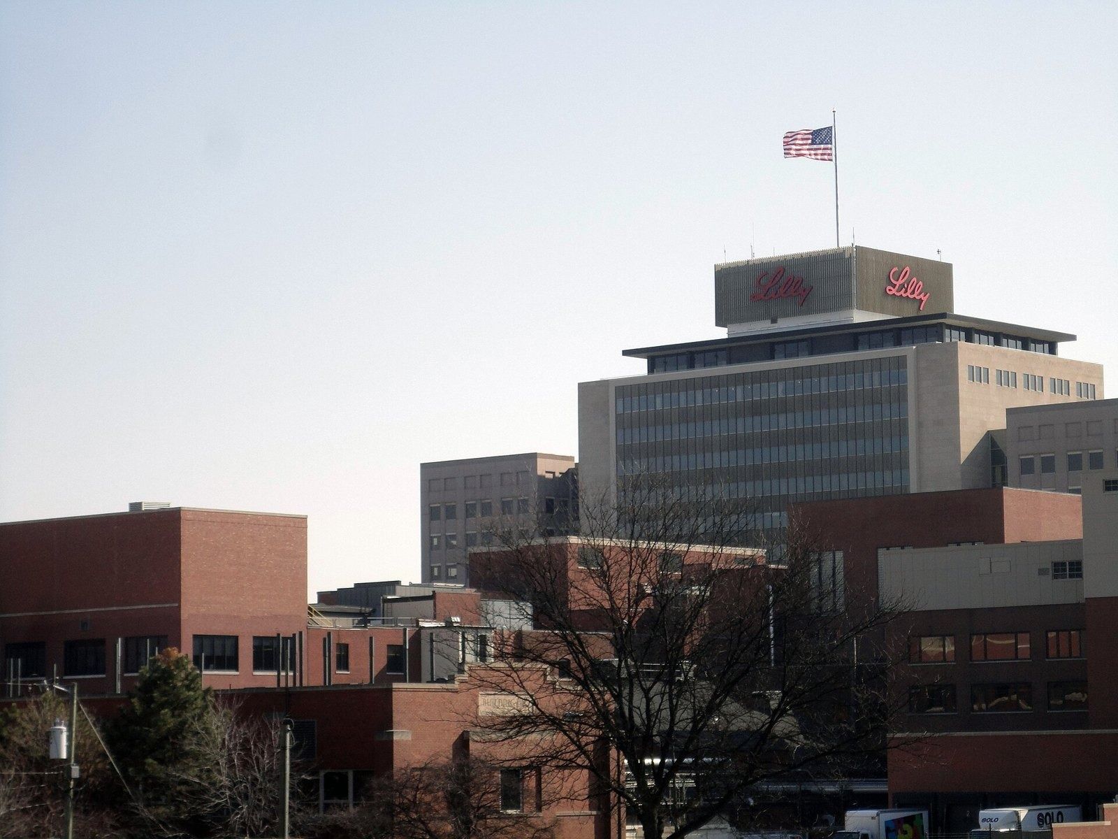 Eli Lilly and Company: The campus with the tower over brick buildings