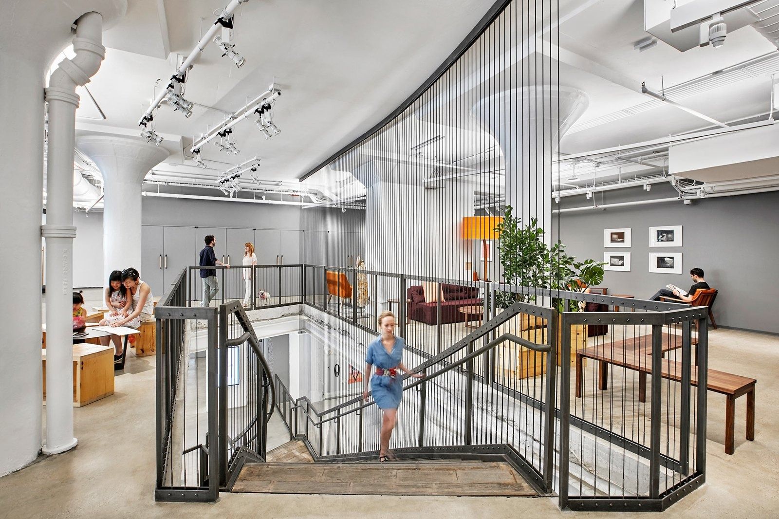 Etsy: Open stair cut through the floor with metal railings