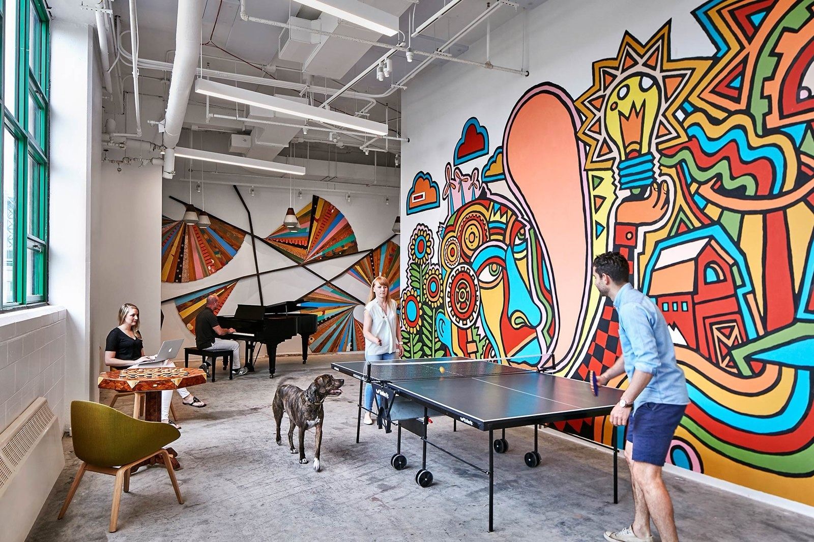 Etsy: Room with a piano, a ping-pong table and a large painted mural