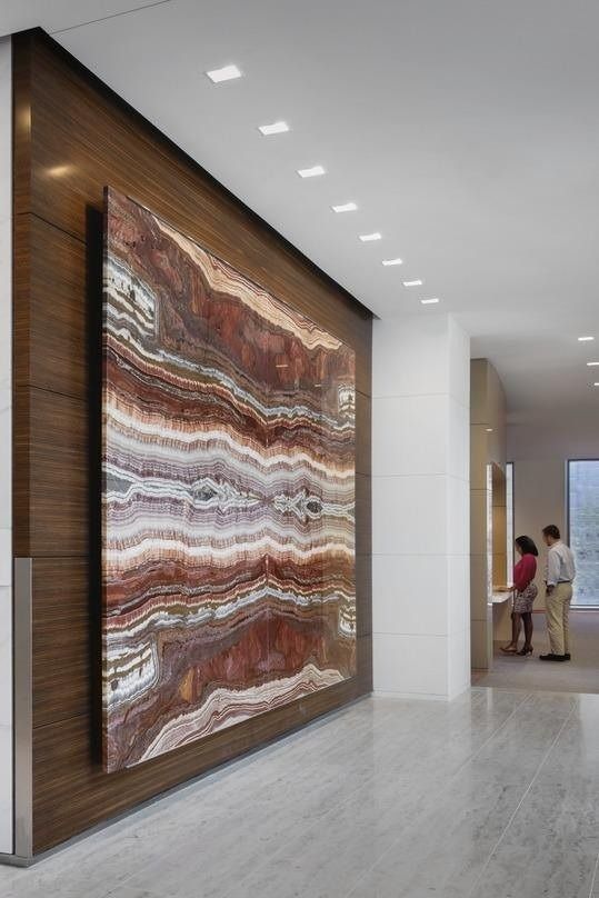 ExxonMobil: Corridor with a large layered artwork