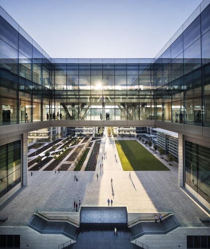 ExxonMobil: Courtyard between glass buildings