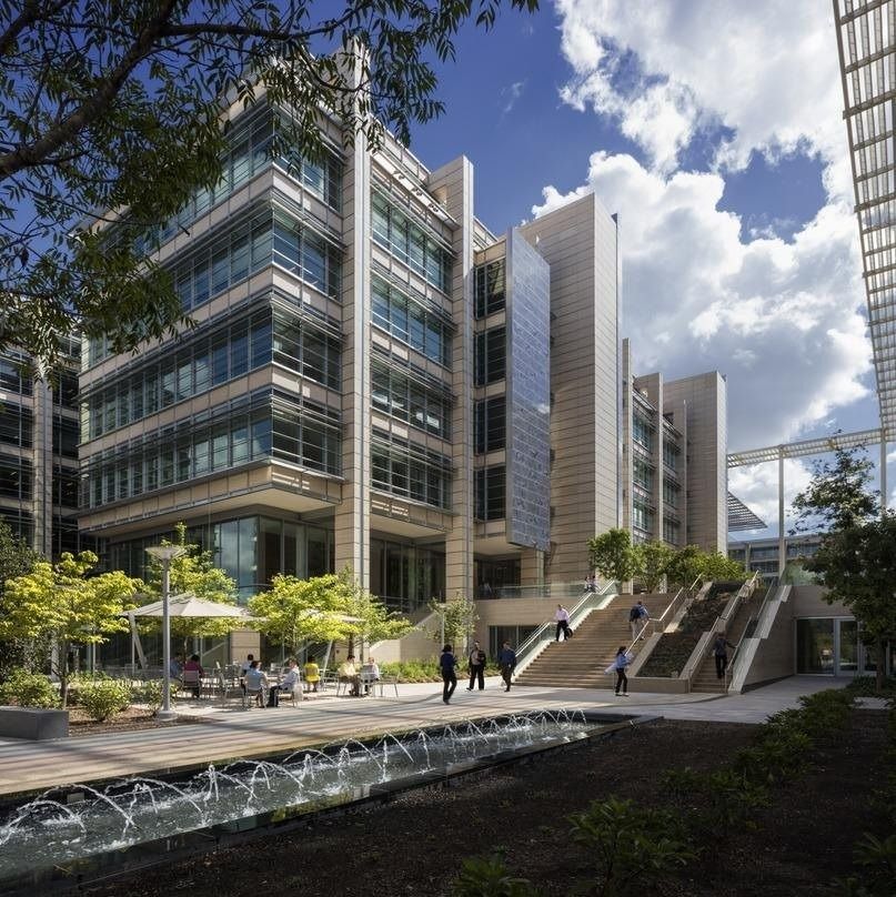 ExxonMobil: Office building beside a stream and trees