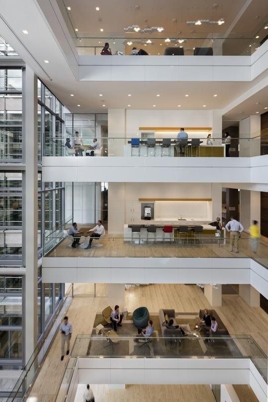 ExxonMobil: Stacked balconies in a light-filled atrium