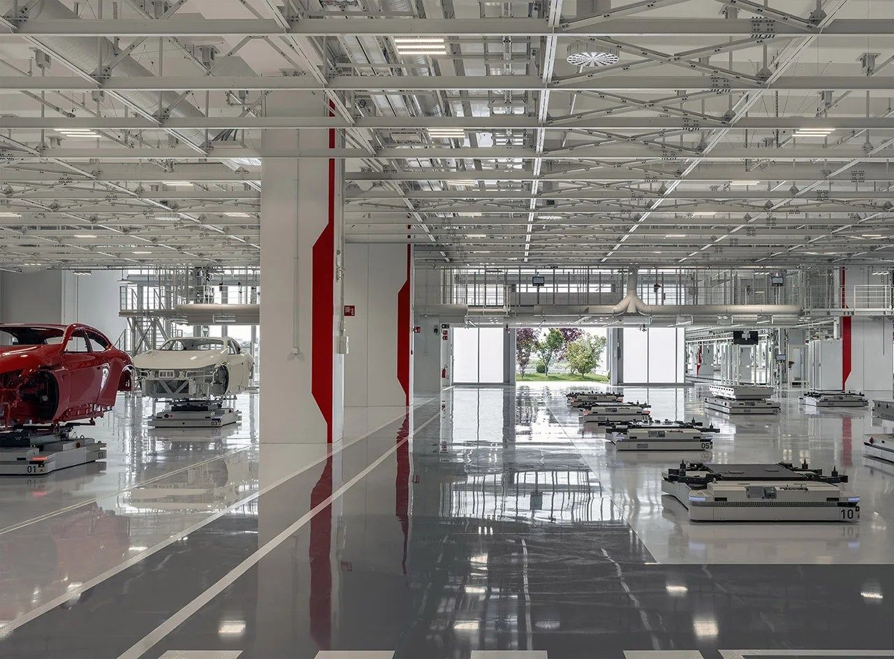 Ferrari: Factory floor with a red car