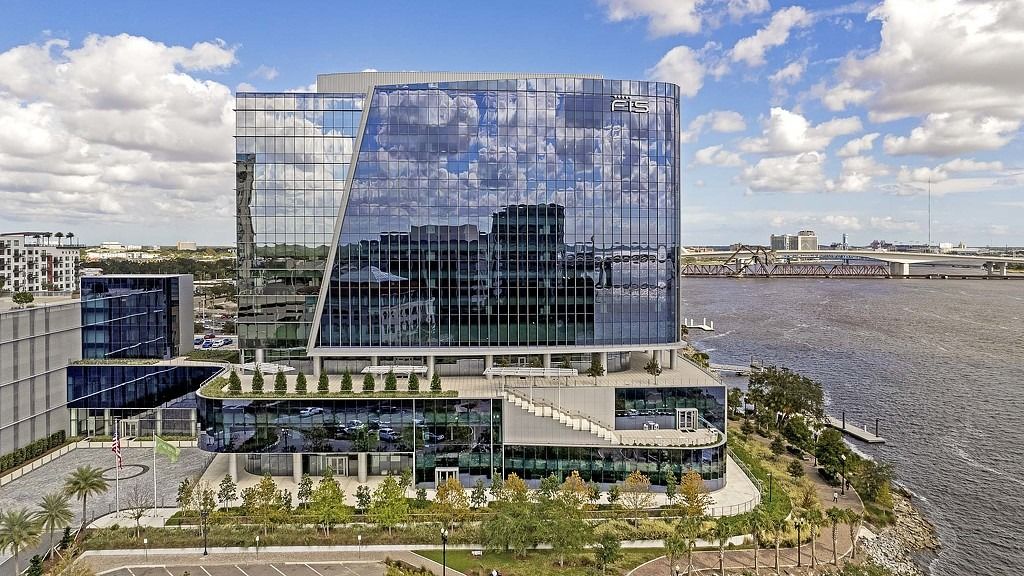 FIS: An angular glass tower with a rooftop terrace next to the river