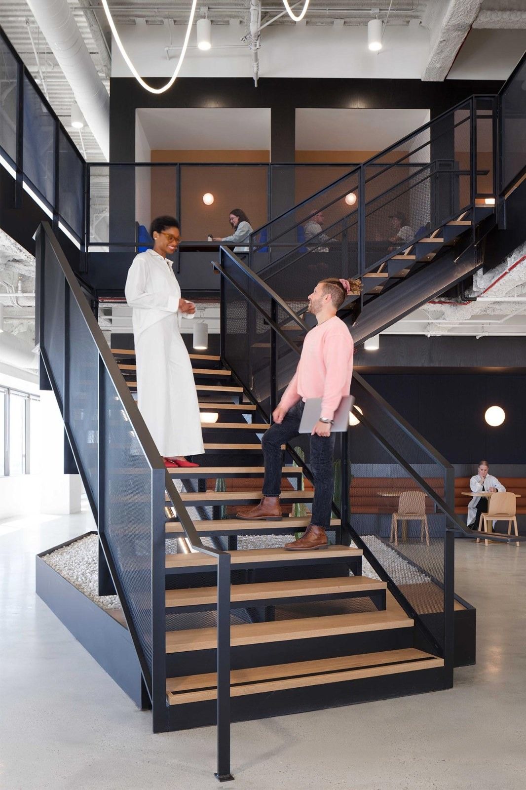 Fivetran: A black steel stair with wooden treads