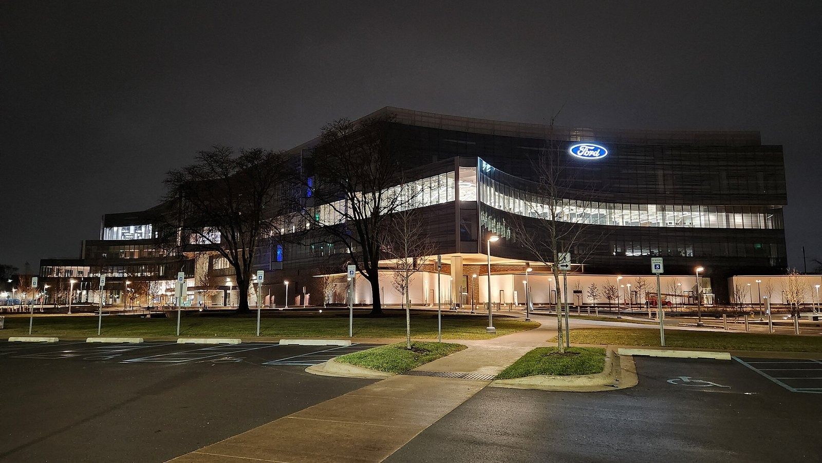 Ford Motor Company: Building lit at night