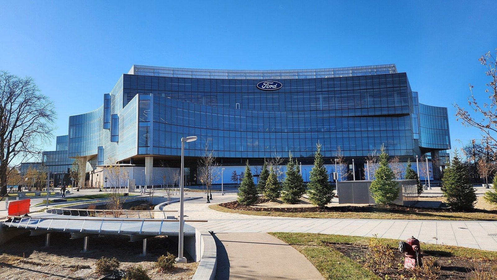Ford Motor Company: Glass headquarters with the Ford logo