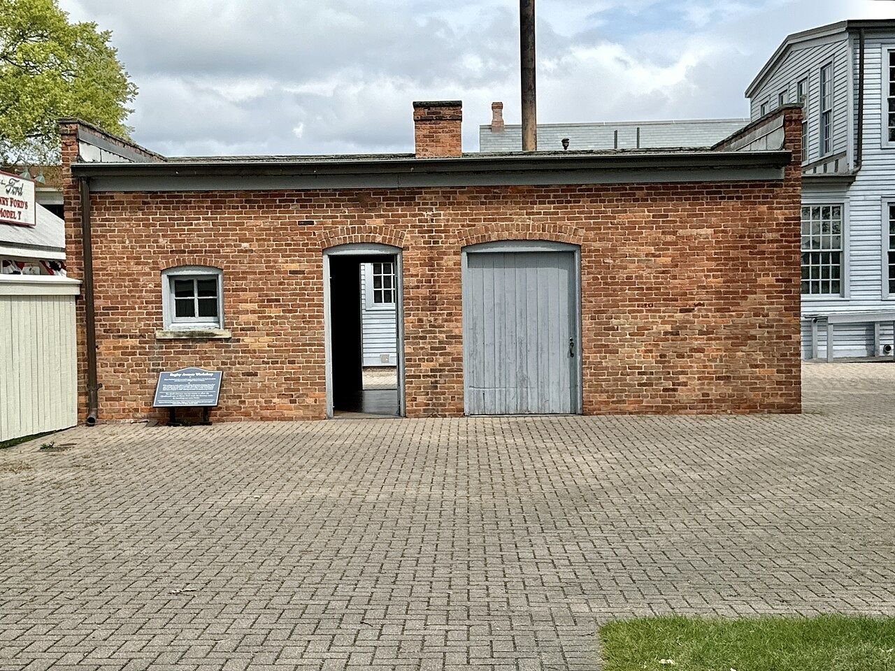 Small brick workshop with two doors