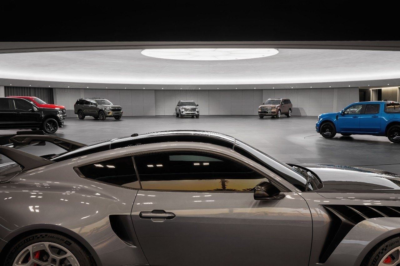 Ford Motor Company: Mustang and SUVs in a round showroom