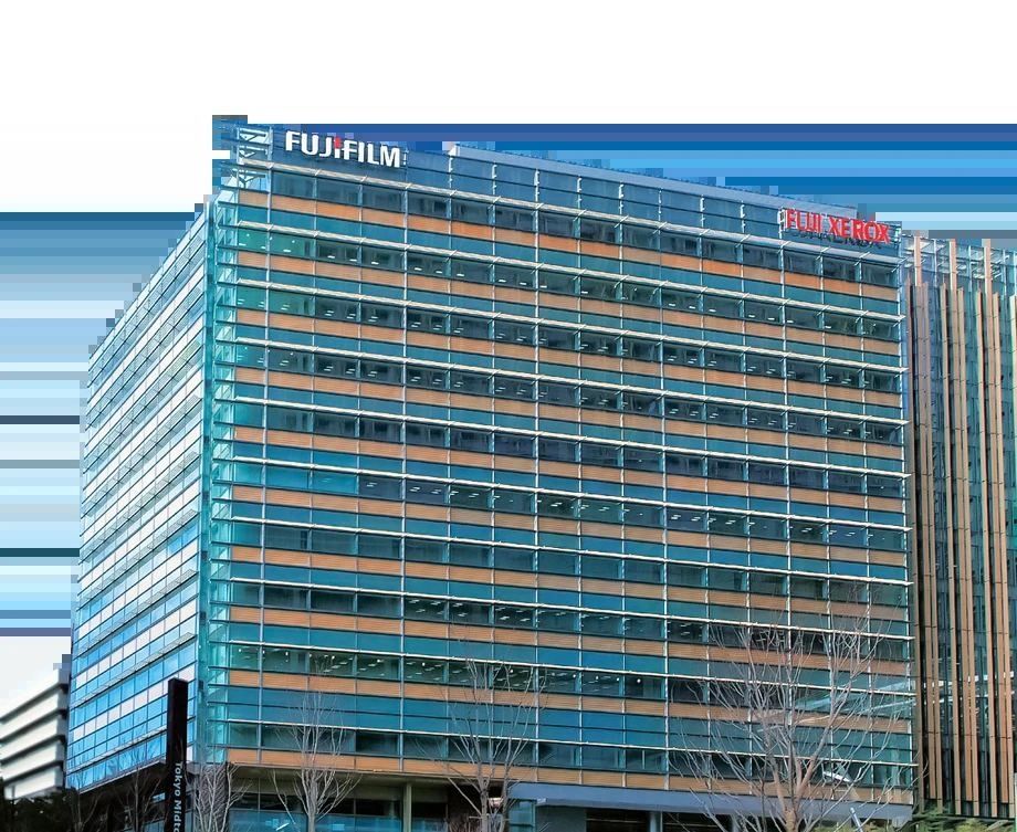 Fujifilm: Mid-rise glass office building with a Fujifilm sign on the roofline