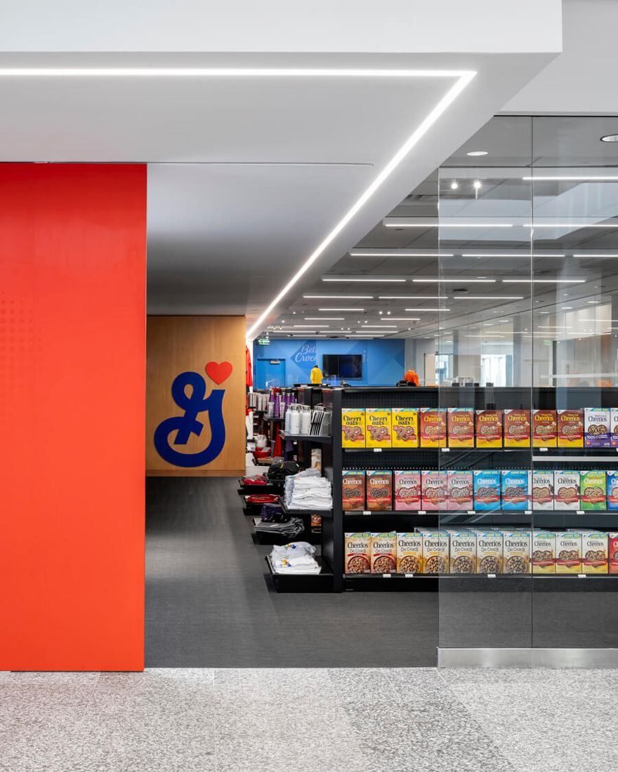 General Mills: Store entrance with a red column and shelves of cereal boxes