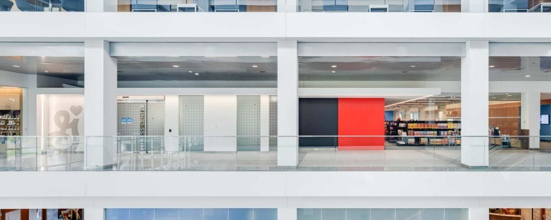 General Mills: White multi-storey atrium with balconies and a red accent wall