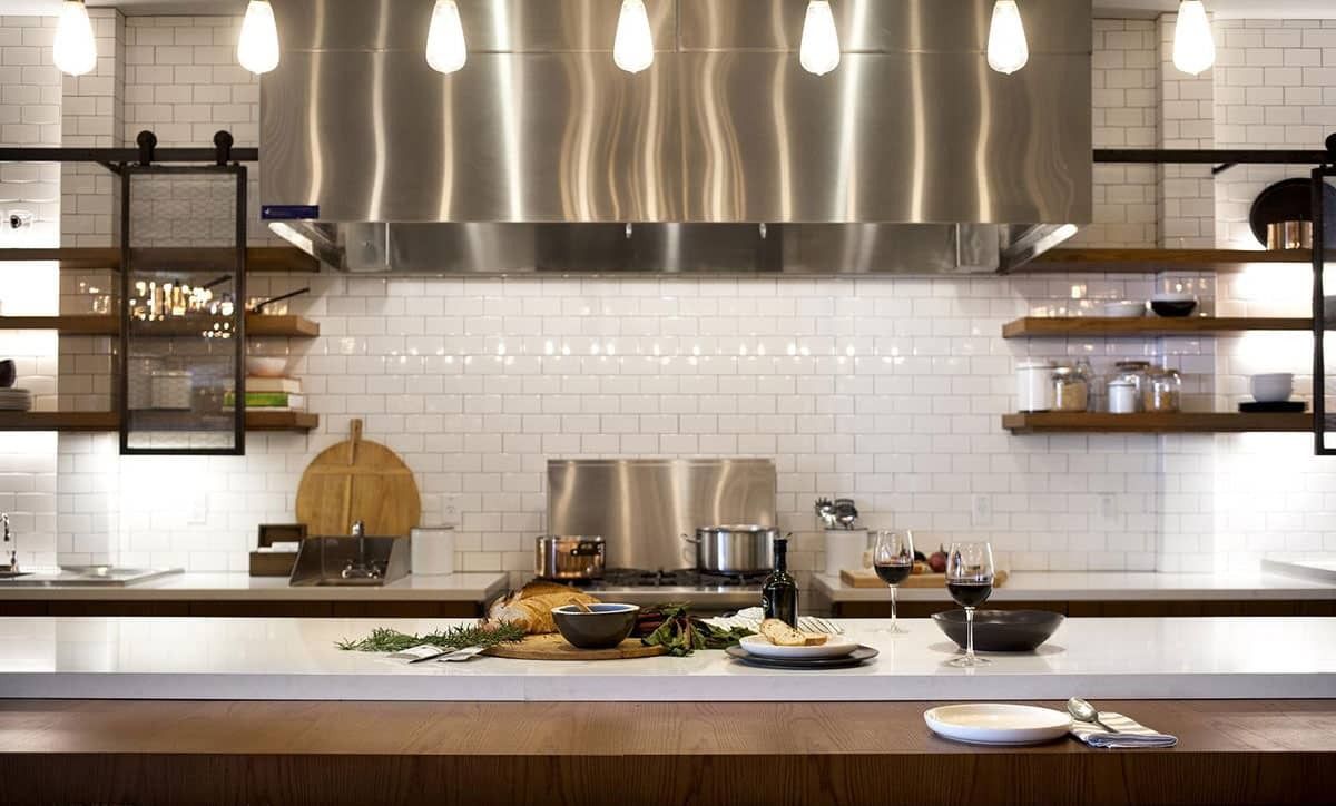 GitHub: Kitchen counter with steel hood and white tiles