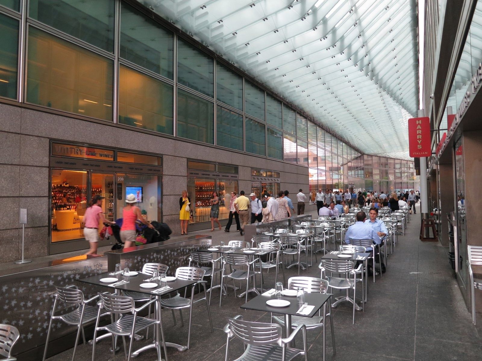 Goldman Sachs: A long glass canopy over a café walkway