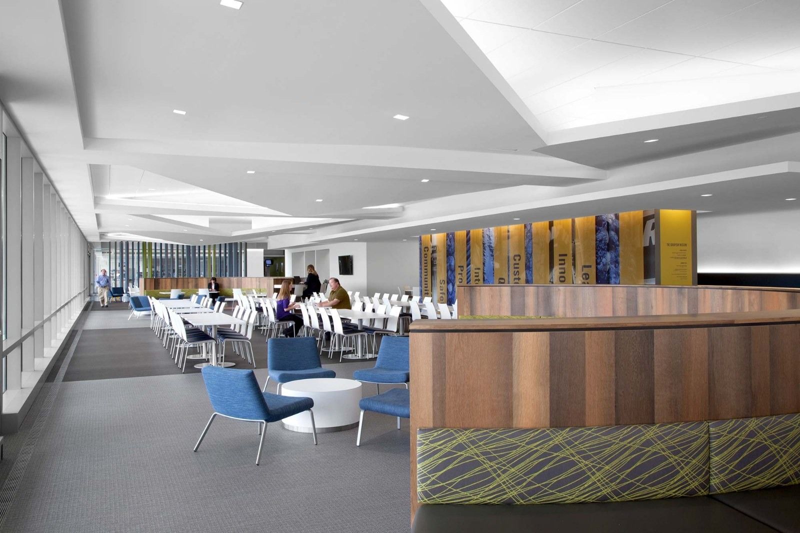 Goodyear: A café with long tables and wood panels