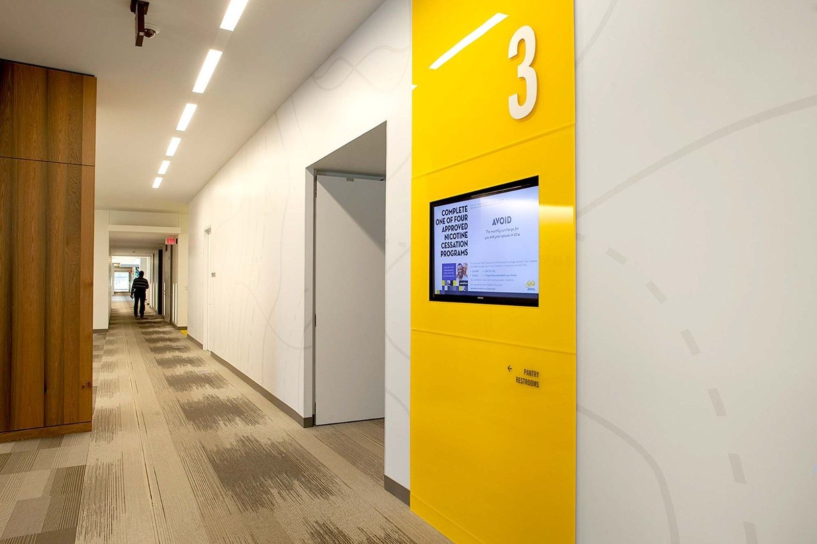 Goodyear: A corridor with a yellow wall marked 3