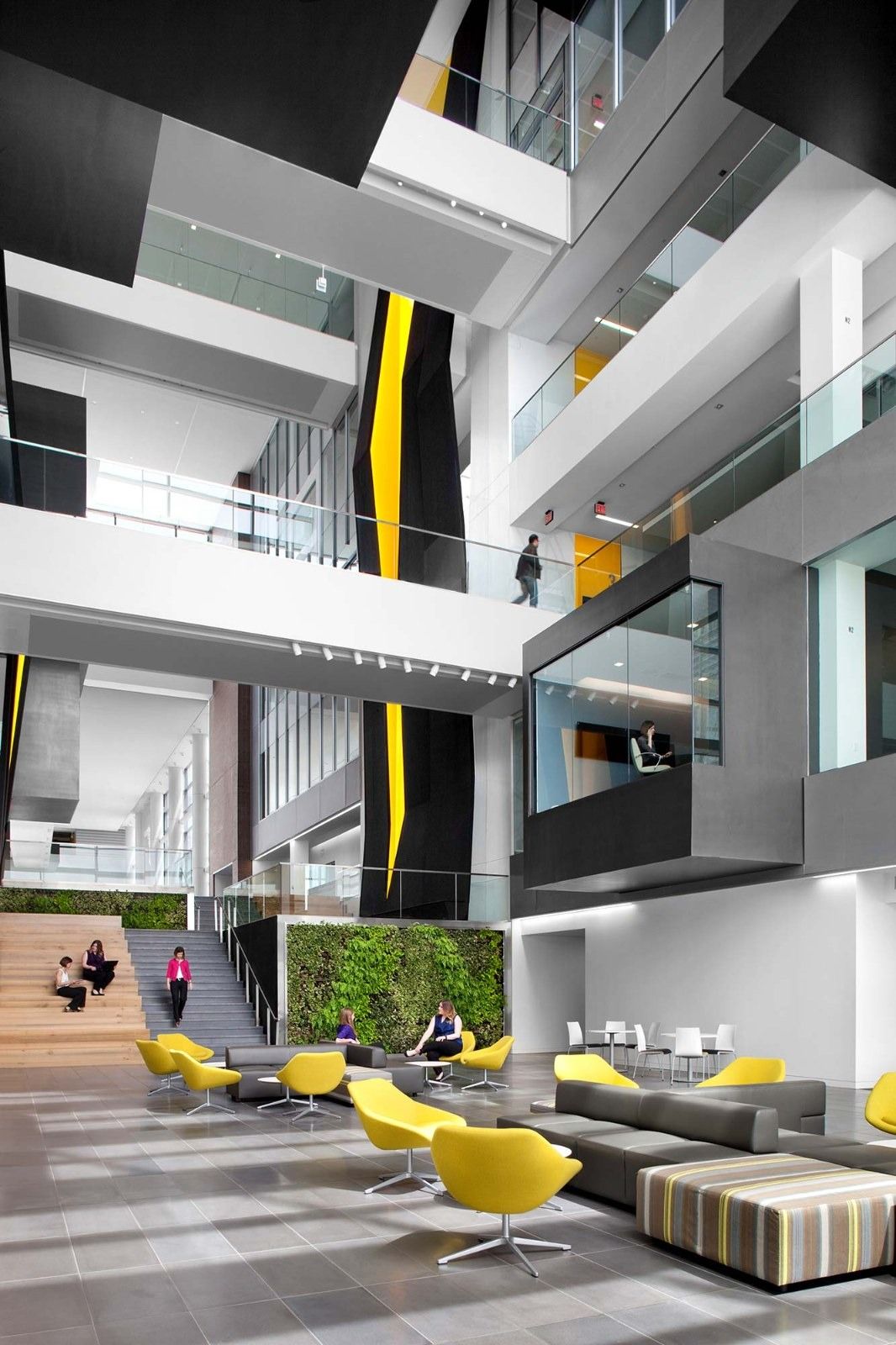 Goodyear: An atrium with yellow chairs and balconies
