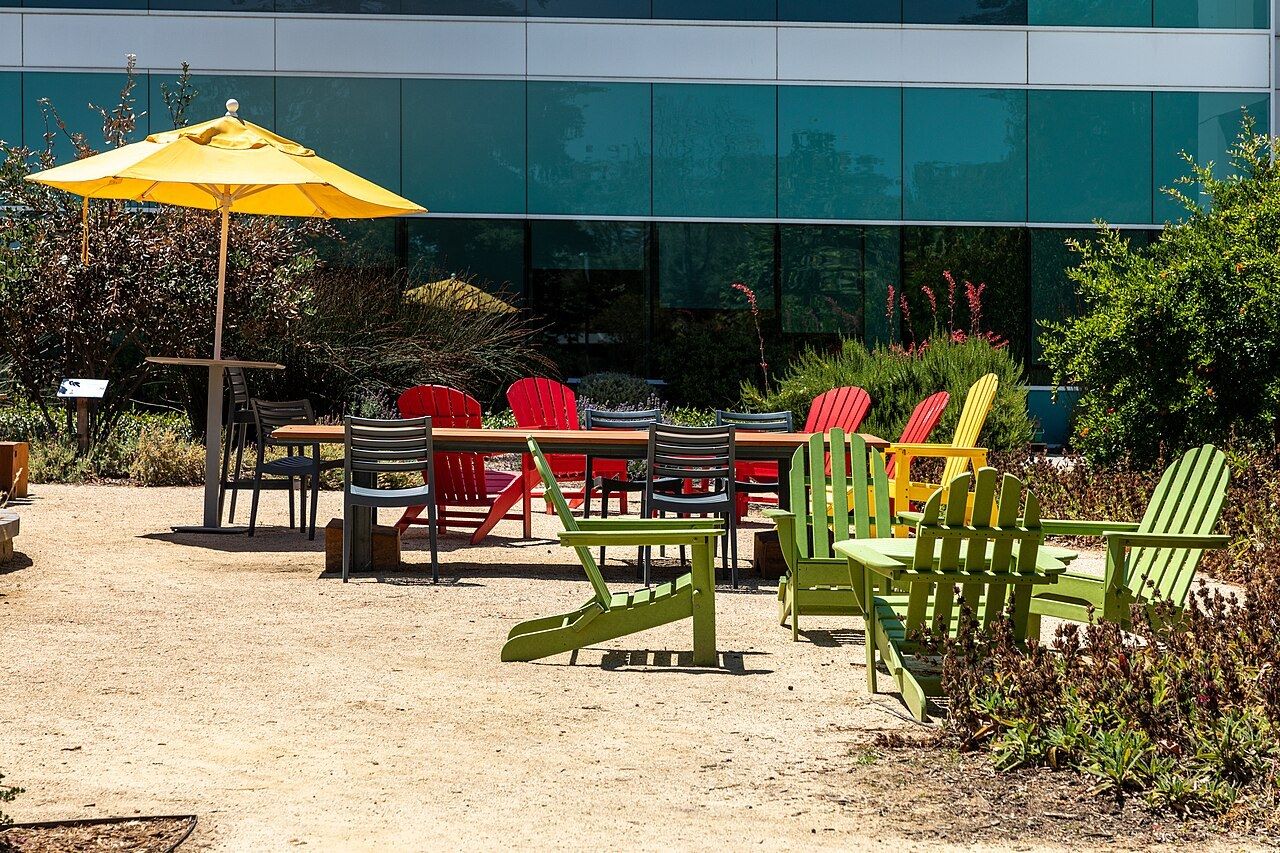Google: Colorful chairs and umbrellas outside a Google building