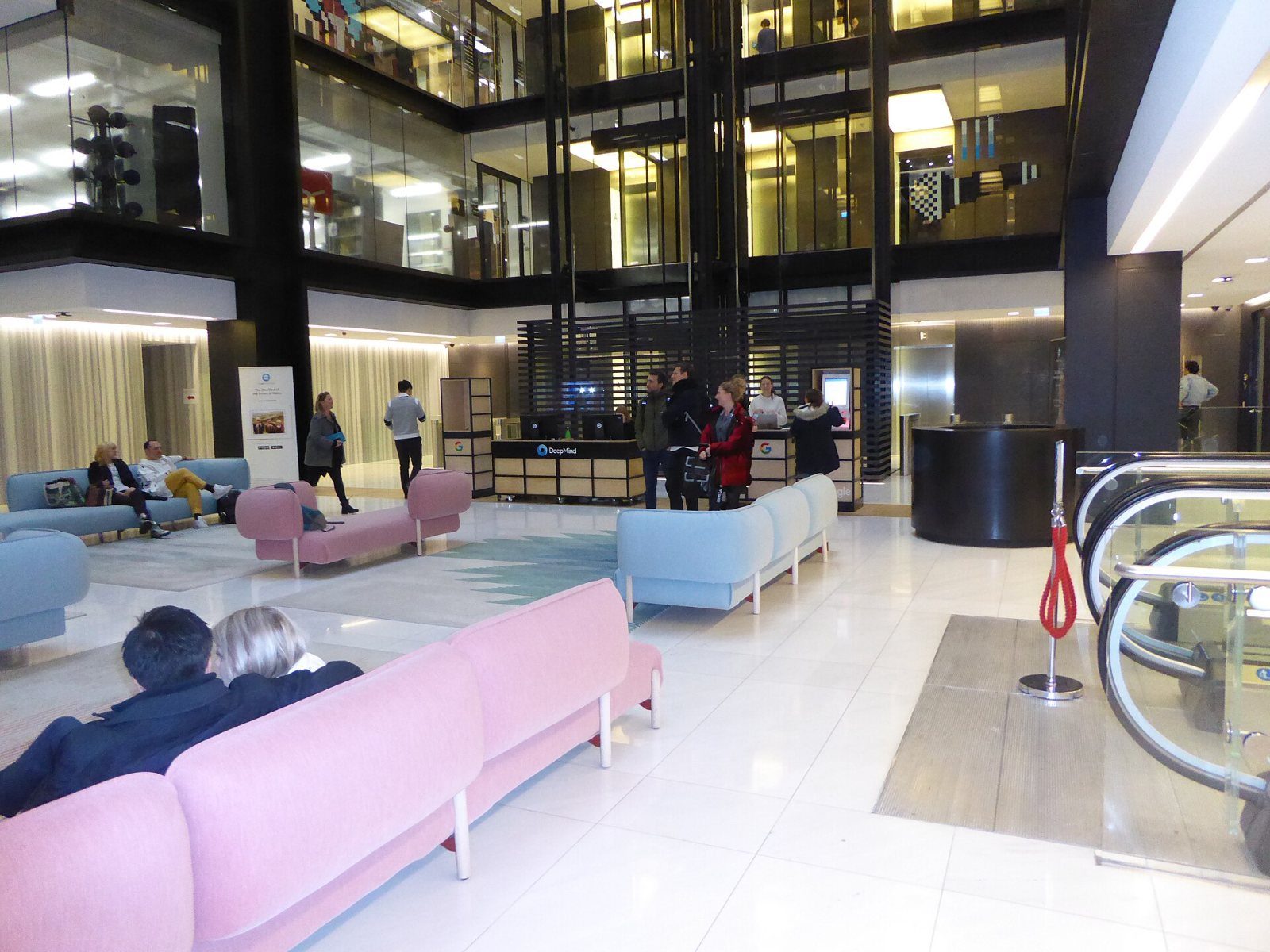 Google: Lobby with pink sofas and glass floors above