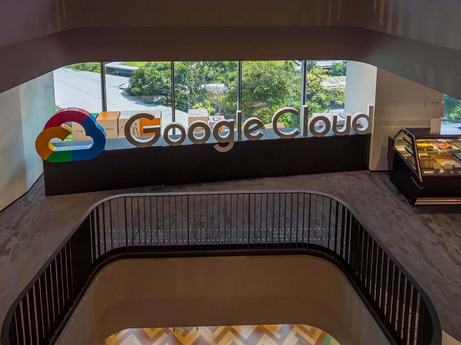 Google: Atrium with a Google Cloud sign and staircase