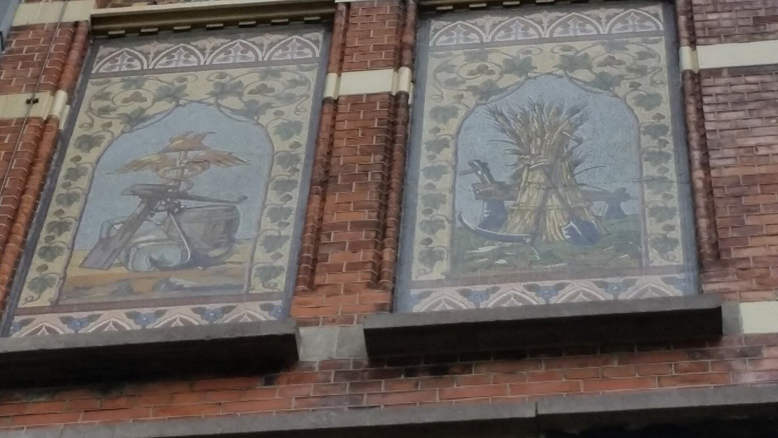 Heineken: Two blue-and-white tile panels set into a brick wall